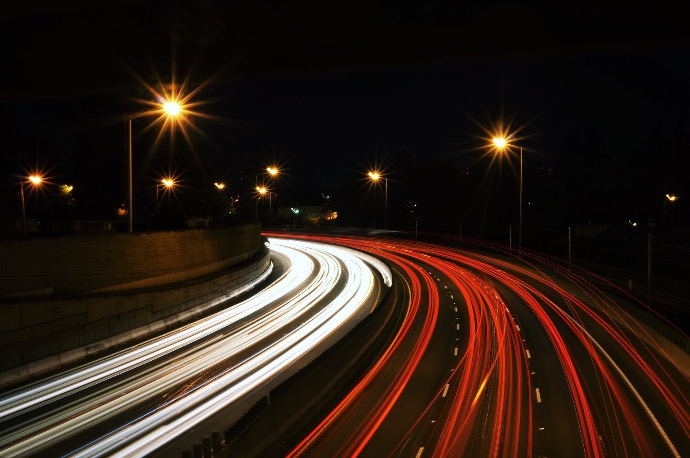 time-lapse photography of highway road at night